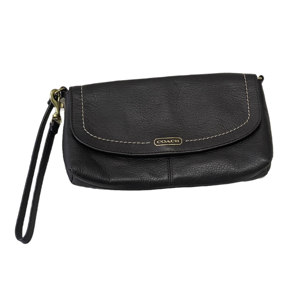 The most beautiful dark brown coach purse.